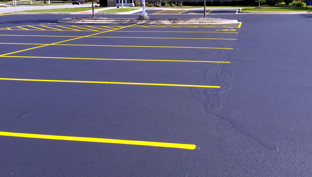 Iowa Parking Lot Pavement Repairs, Striping, Accessories