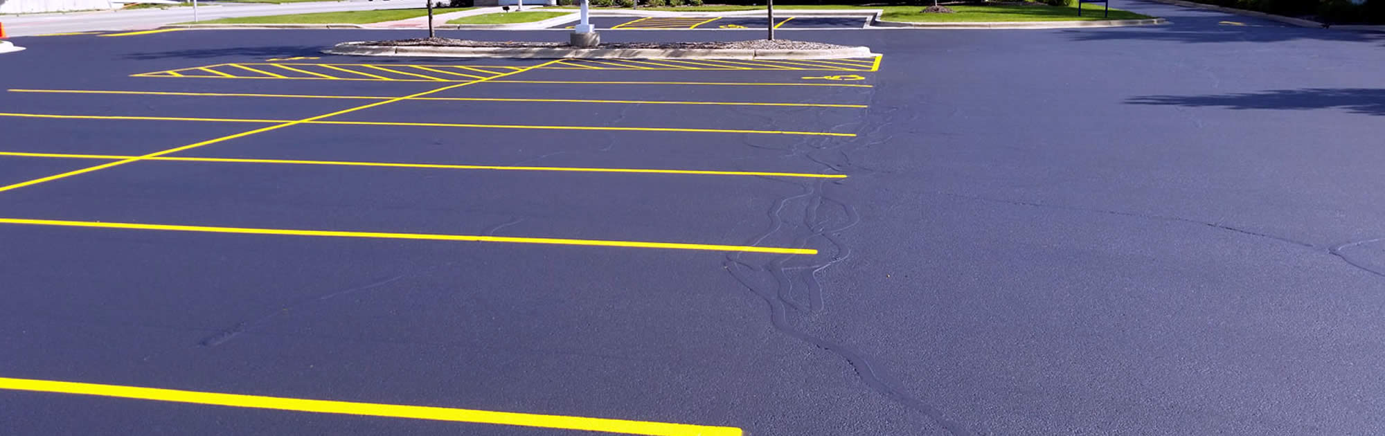 Iowa Parking Lot Pavement Repairs, Striping, Accessories