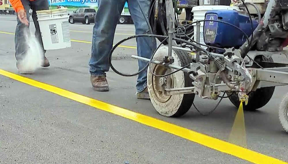 Iowa Parking Lot Pavement Repairs, Striping, Accessories