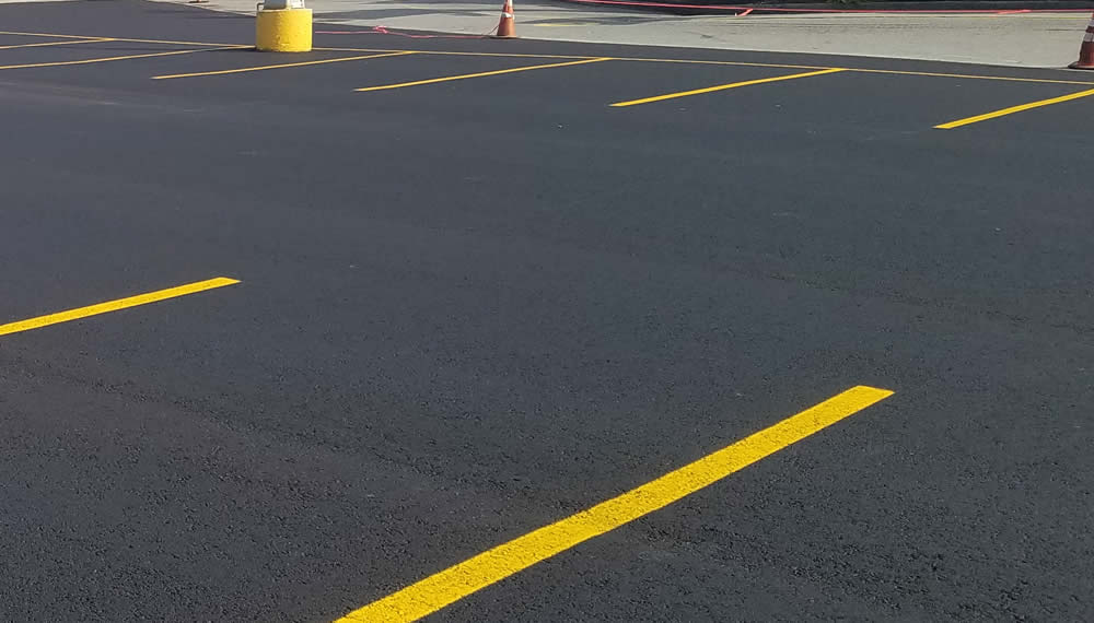 Iowa Parking Lot Pavement Repairs, Striping, Accessories