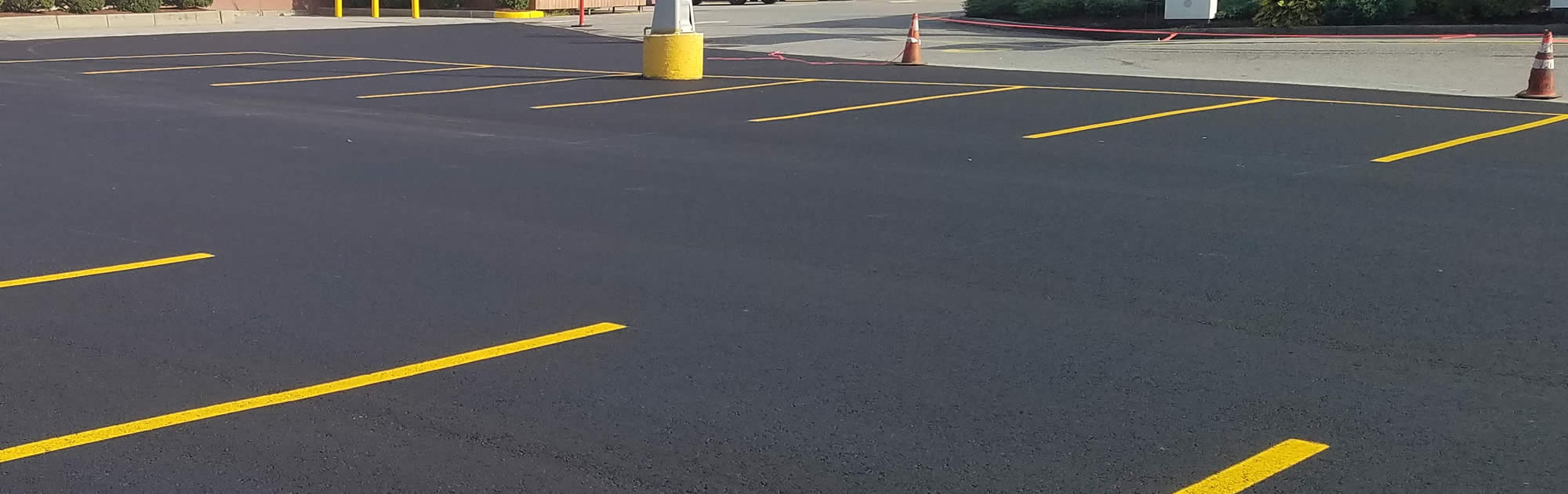 Iowa Parking Lot Pavement Repairs, Striping, Accessories